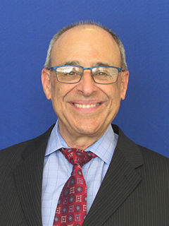 head shot of Advisory Board Member: Attorney Richard S. Bishop in suit and tie
