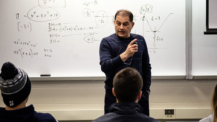  Majid Chatsaz, Ph.D. Assistant Professor, Engineering at front of classroom
