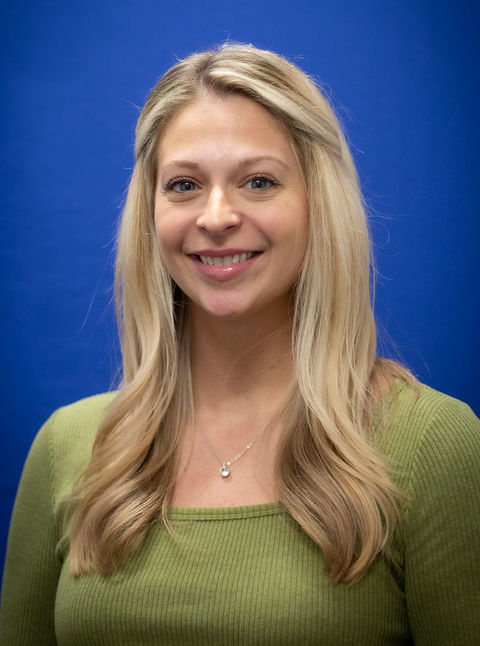 headshot of smiling Courtney Shingler