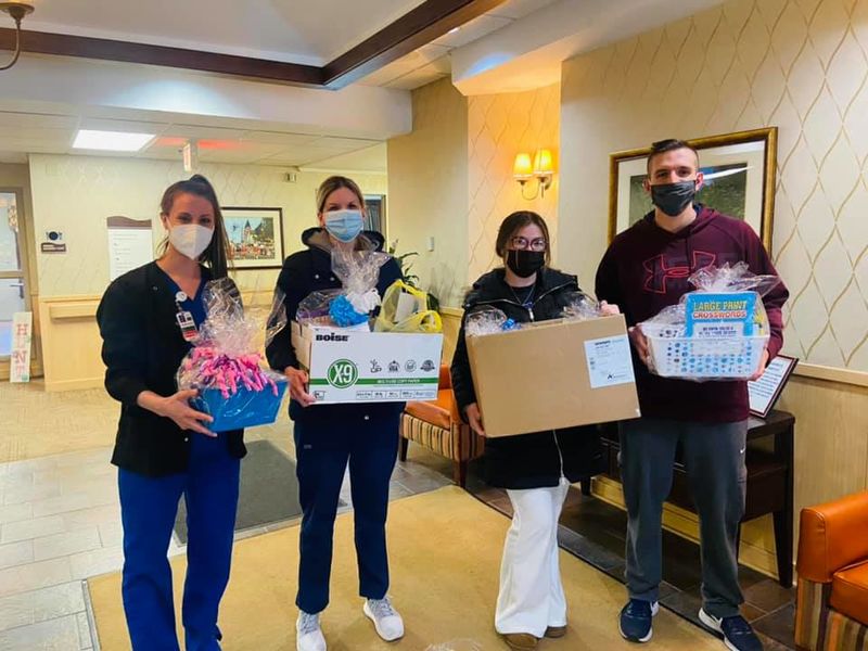 Nursing students deliver gift baskets to nursing home residents