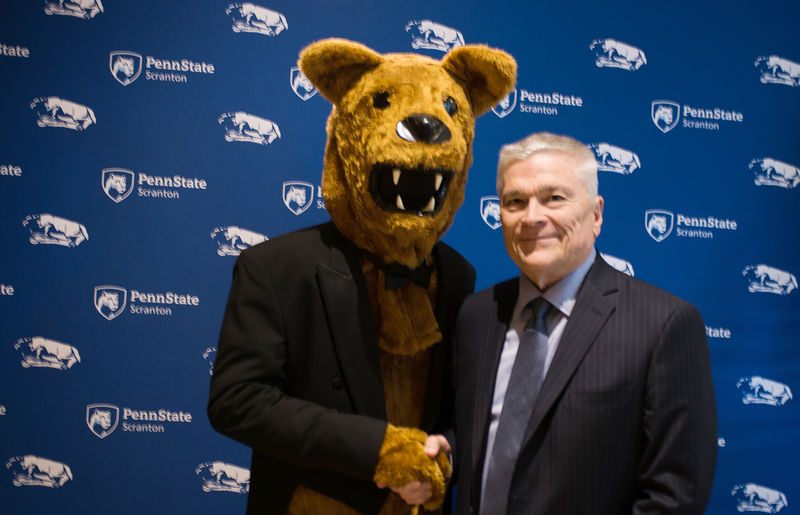 Dr. Eric Barron with the Nittany Lion