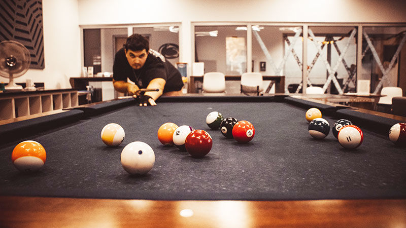 student playing pool 