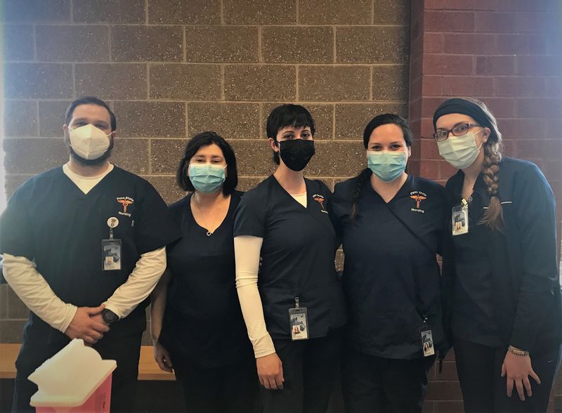 Penn State nursing students pose for a photo at a recent vaccination clinic held at North Pocono High School