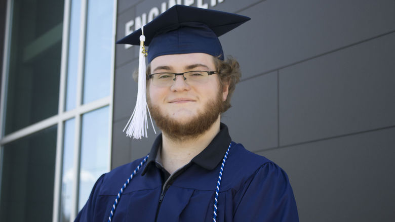 Student wearing commencement regalia