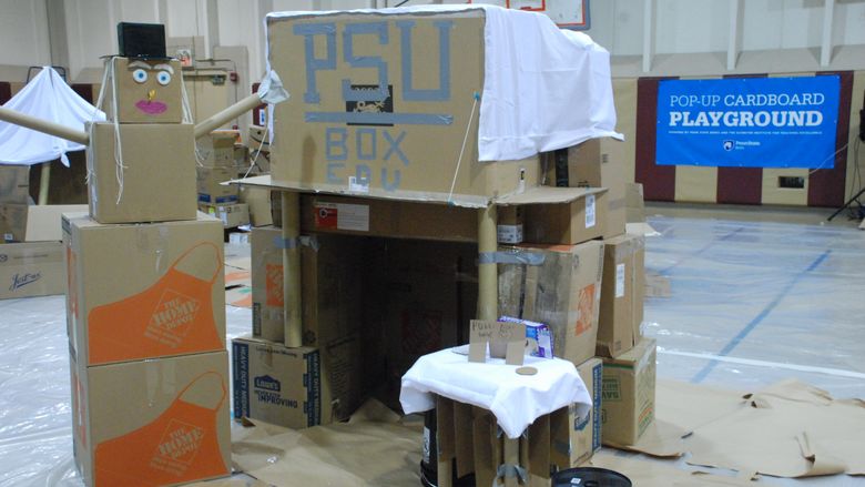 Cardboard box fort and snowman