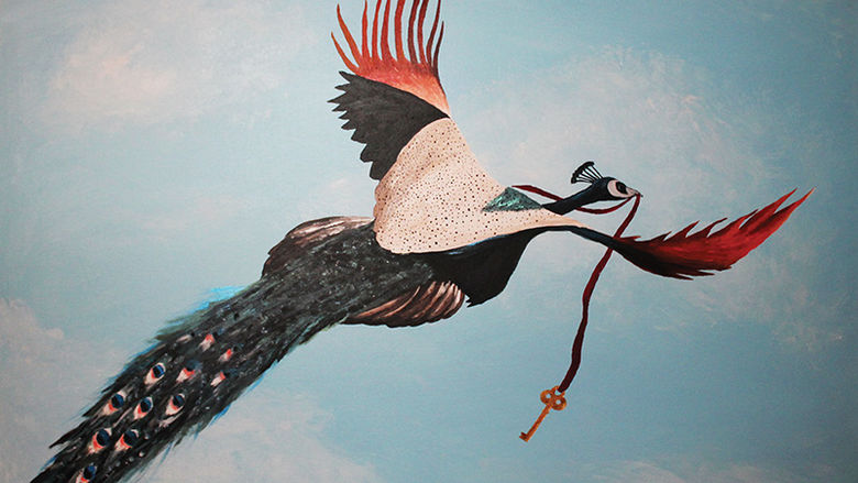 a peacock flies with a key in its beek