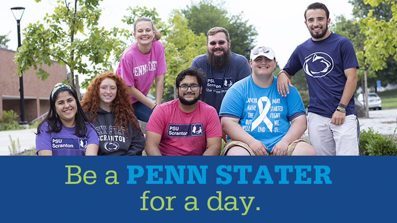 Six students in colorful Penn State tee shirts gather on the patio.