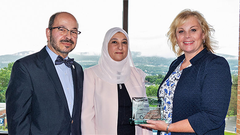 Dr. Wafa and Sahar Al Masri receiving Ridge View award