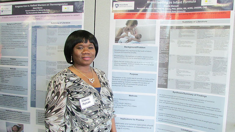 student with research poster