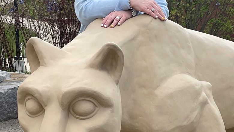 Lynn Jesuit-Donnini at the Scranton campus Lion Shrine
