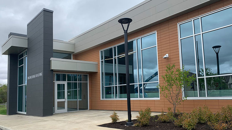 modern entrance to a one story brick engineering building