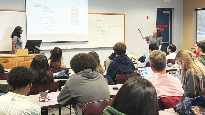 High school students enjoy a presentation by Penn State Engineering Ambassadors