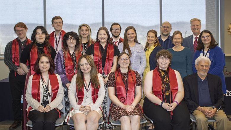 group of honor society inductees pose for a group photo