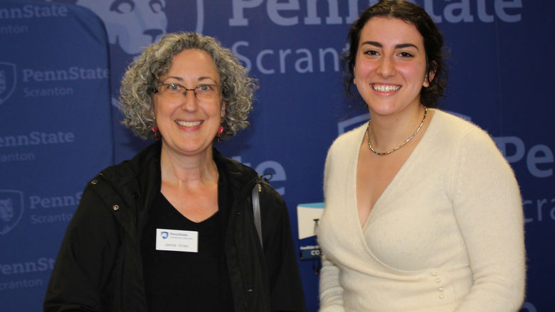Marie LaRosa accepts library award