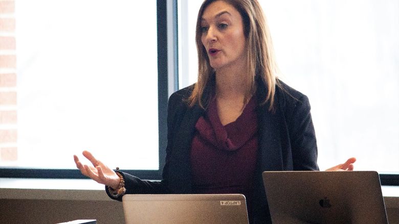Katrina foster addresses students