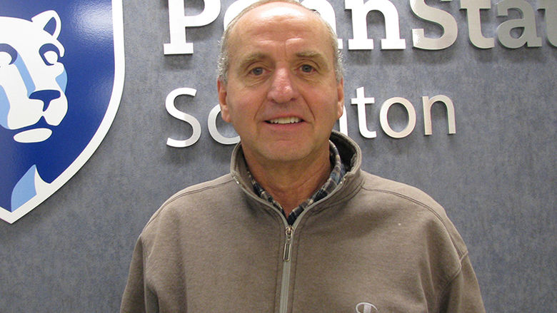 headshot of Jake Hinton