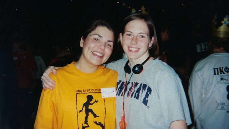 Julie and a friend pose on the dance floor during THON 1999
