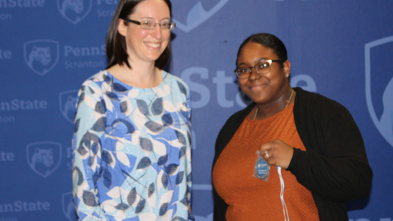Kaylah Simmons receives her award