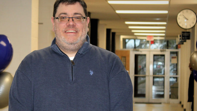 photo of Mike Evans in Dawson Building hallway