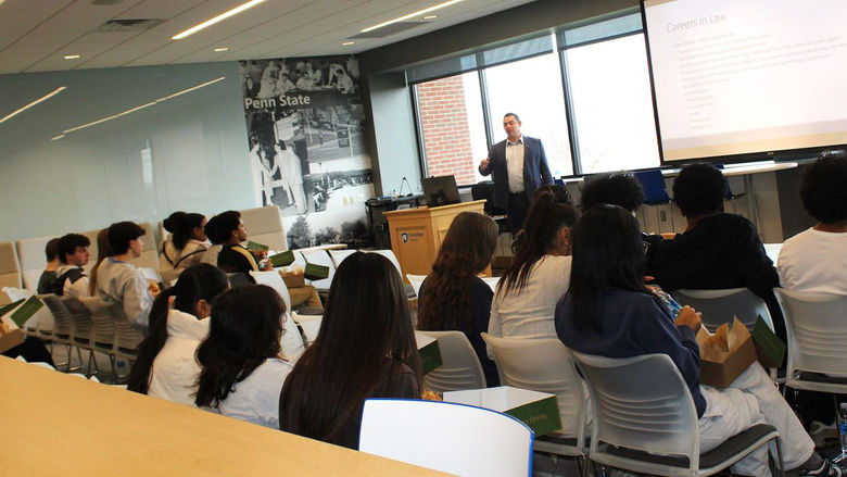 Attorney Joseph Litvak talks to students in the Sherbine Lounge