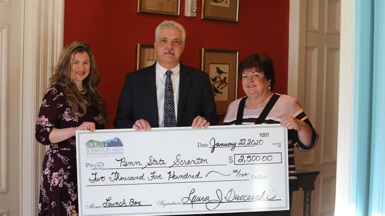 SAF director presents grant check to John Drake, Penn State Scranton