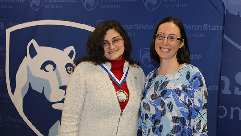 Maria Veniamin accepts her award 
