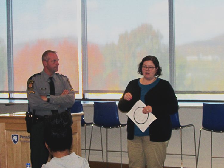 Trooper Urban and Ms. Iannetta speaking to students 