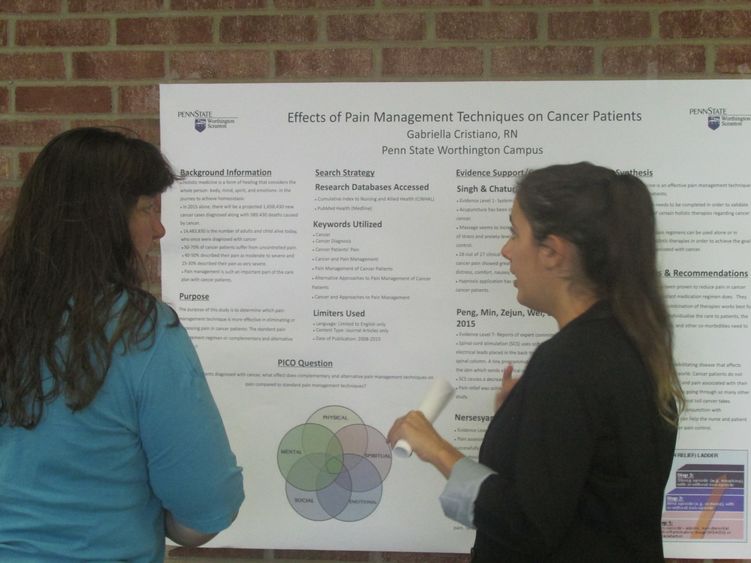 Nursing student Gabriella Cristiano explains her project to Dr. Renee Bishop
