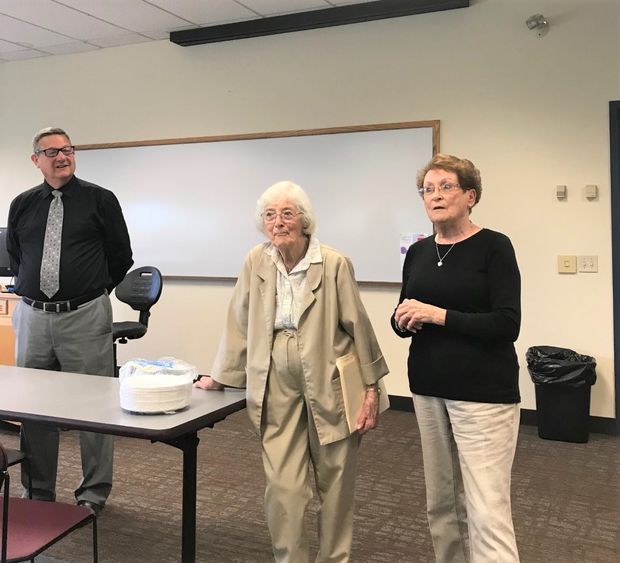 Dr. Todd Adams introduces WWII speakers to the class