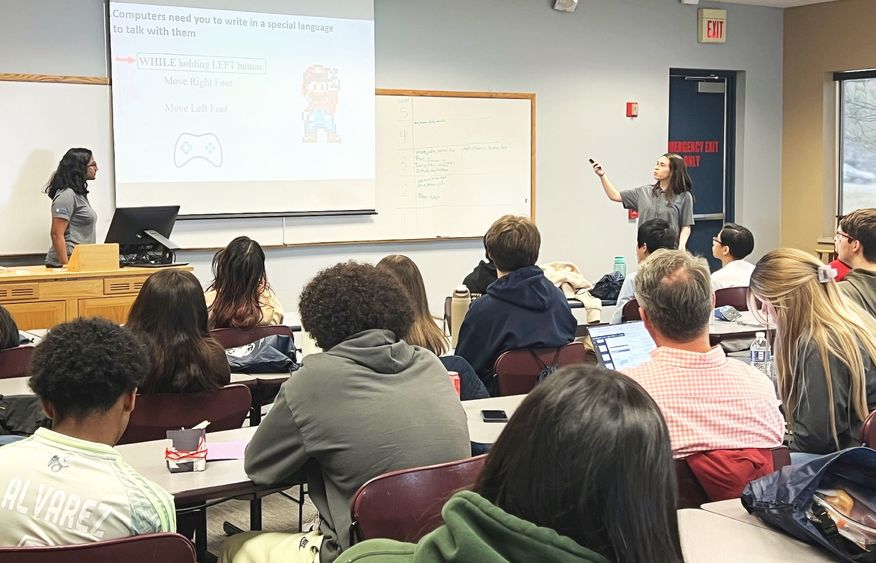 High school students enjoy a presentation by Penn State Engineering Ambassadors