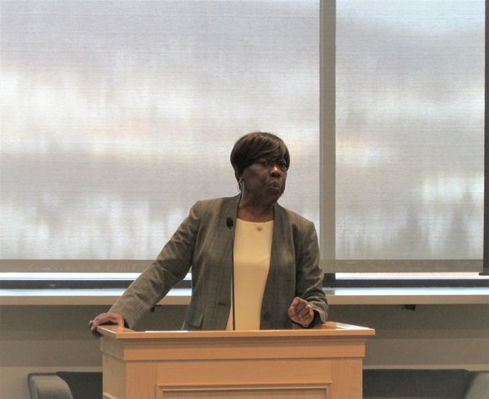 Bettie Mae Fikes at podium speaking to crowd at Penn State Scranton