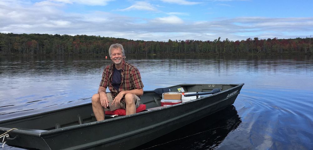 Dr. Dale Holen in boat at state park