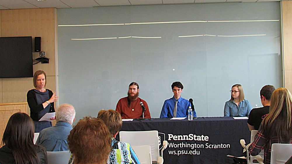 Dr. Kelley Wagers, at left, introduces panelists at this year's English Senior Symposium